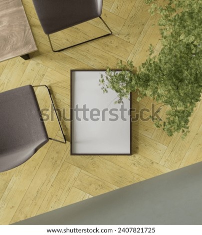 cinematic top shot of wooden frame mockup poster laying on the parquet floor in the modern interior