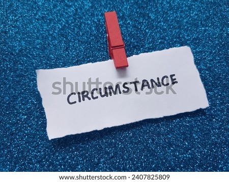 Circumstance writing on blue background. Royalty-Free Stock Photo #2407825809