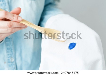 Eco-friendly remove of stains on clothes. Dirty permanent ink stain. daily life stain concept. High quality photo Royalty-Free Stock Photo #2407845175