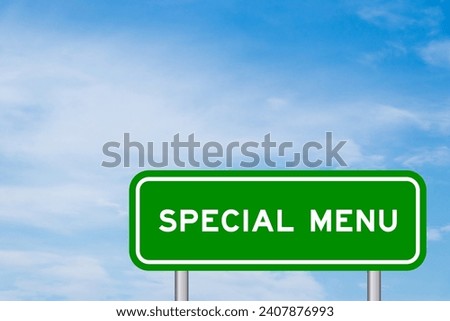 Green color transportation sign with word special menu on blue sky with white cloud background Royalty-Free Stock Photo #2407876993