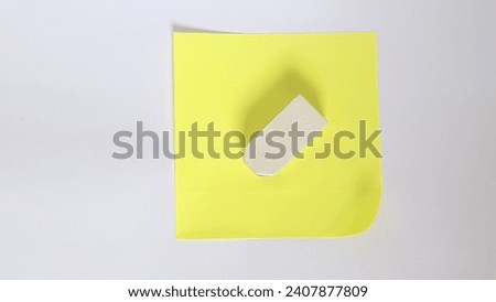 Used pencil eraser with white color base on top of sticky note