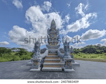 A new temple has been built in the city of Samarinda with cloudy sky Royalty-Free Stock Photo #2407883409