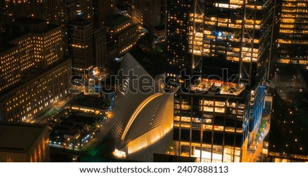 Aerial Photo with Lower Manhattan Financial District with Office Architecture at Night. Picture Focusing on Oculus Station at World Trade Center Transportation Hub