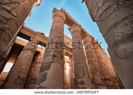 Luxor, Egypt - December 26 2023: Hypostyle Hall with huge columns in Karnak temple Royalty-Free Stock Photo #2407895697
