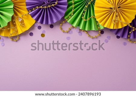 Festive Elegance Unveiled: top view of traditional beads, confetti, and vibrant paper fans showcased on a lilac background, leaving empty space for text or promotional messages