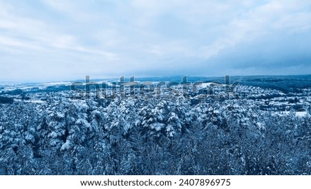 drone shot of a snow-covered forest. Winter pictures in the forest. drone shot over forest