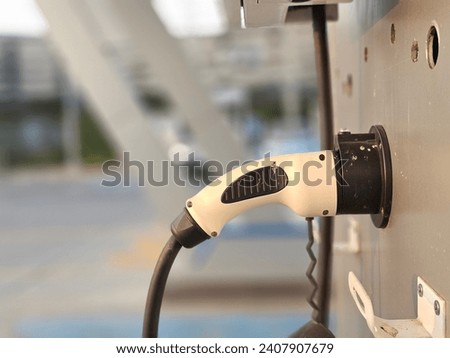 The power supply for Charging of an electric car:Use for website banner background,backdrop