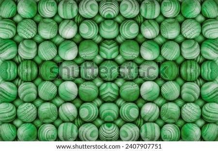 green wooden sphere ball pattern arranged in rows
