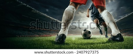 Cropped image of male legs in dirty uniform, football players during game, competing on sport field, 3d outdoor arena. Concept of sport, game, competition, championship. 3D render
