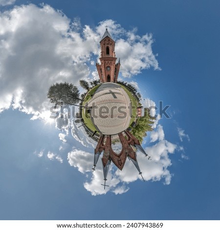 little planet transformation of spherical panorama 360 degrees overlooking church in center of globe in blue sky. Spherical abstract aerial view with curvature of space. Royalty-Free Stock Photo #2407943869