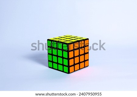 4x4 Rubiks cube shot in white background Royalty-Free Stock Photo #2407950955