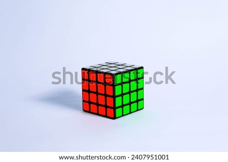 4x4 Rubiks cube shot in white background