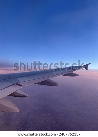 Airplane view beautiful blue and purple sky