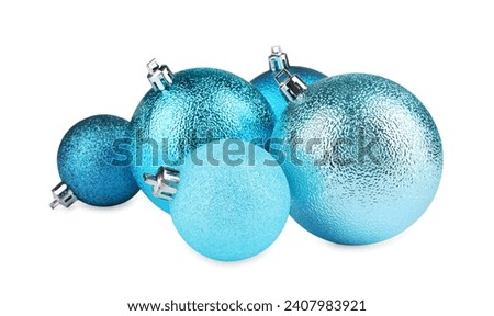 Beautiful light blue Christmas balls isolated on white