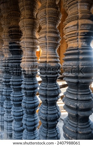 Close up view of historic rock carved spindles at Angkor wat temple, Amazing architecture built in 11th century.