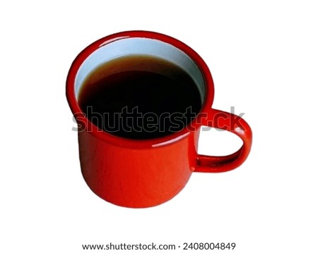 In the picture is a red aluminum mug with a red handle. The inside of the glass is white. Inside the glass is coffee water. Nothing is clear except coffee and hot water. Place one glass in it.