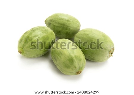 inexperienced melon on white background Royalty-Free Stock Photo #2408024299