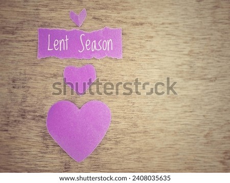 Lent Season, Holy Week and Good Friday concepts - Lent Season text on torn purple paper background. Stock photo

