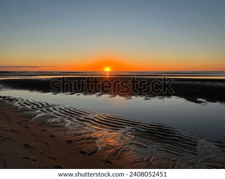 Sunset at the Delaware Bay Royalty-Free Stock Photo #2408052451