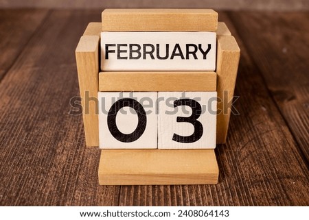 Flower pot and calendar for the snow season from 03 February. Winter time