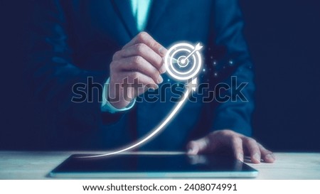 Digital marketing. Businessman touching darts aiming at the target icon. Business goal and technology concept