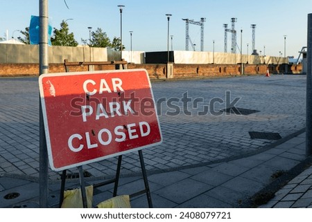 red car park closed sign