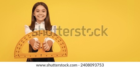 cheerful kid in school uniform hold mathematics protractor for measuring, high school. Banner of schoolgirl student. School child pupil portrait with copy space.