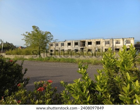 Multi-storey building that has not been completed. Abandoned building in the countryside