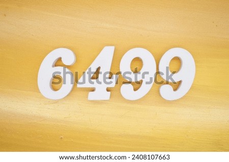 The golden yellow painted wood panel for the background, number 6499, is made from white painted wood.