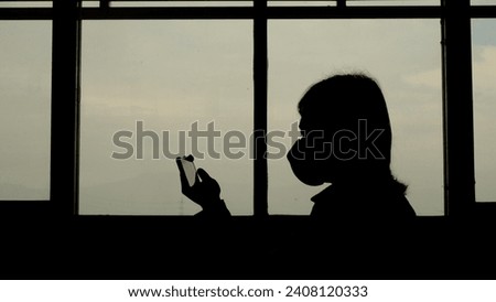 pictures of people with silhouette near windows. Pictures of people going outside
