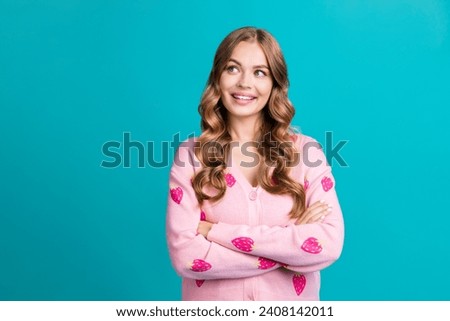 Photo of young woman wearing pink stylish glamour sweater strawberry print look minded folded hands isolated on blue color background