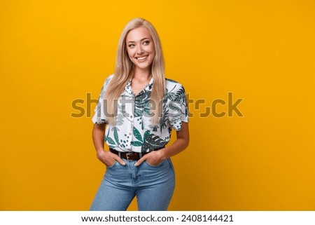 Photo of satisfied adorable woman with straight hairdo dressed print shirt look at sale empty space isolated on yellow color background