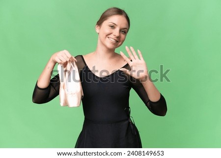 Young beautiful blonde woman practicing ballet over isolated background counting five with fingers
