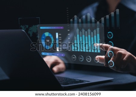 Businessman working with data management system on computer to make report with KPI and metrics connected to database. finance, operations, sales, marketing, KPI, business performance indicators. Royalty-Free Stock Photo #2408156099