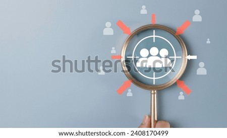 Planning development leadership concept. Job recruitment, Target customer, Buyer persona. Magnifier glass focus to personnel icon which is Personalization marketing, customer centric strategies. Royalty-Free Stock Photo #2408170499