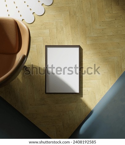 frame mockup poster laying on the wooden floor in the middle of living room