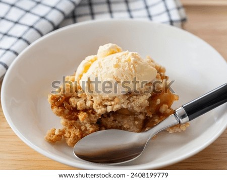 
Apple crumble with ice cream Royalty-Free Stock Photo #2408199779