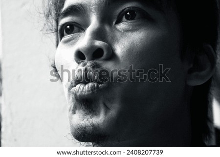 man with emotional face, close up