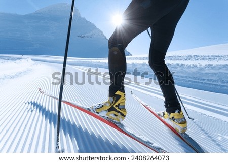cross-country skiing on the top of the mountain Royalty-Free Stock Photo #2408264073