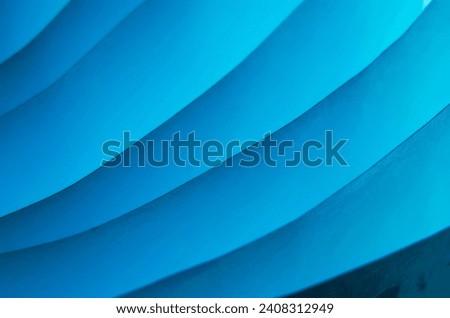Abstract colorful macro background, made with white paper sheets and colorful lights.