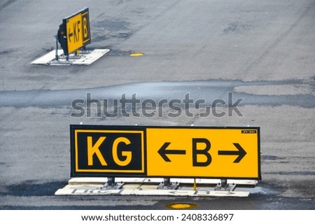 Airfield Signs, Road Markings, and Aviation Navigation. High-quality images for airport engineering, traffic signage, and runway lighting. Perfect for aviation enthusiasts and creative projects. 