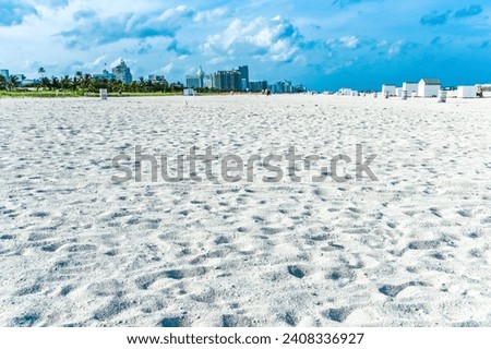 Discover the allure of South Beach through vibrant visuals! Immerse yourself in the sun-soaked landscapes and iconic scenes. Experience the charm of Miami's beaches with a stroll through the sandy Royalty-Free Stock Photo #2408336927