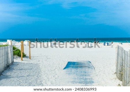 Explore Gulf Shores Vacation Rentals - Beachfront Bliss. Updated Prices for Orange Beach and Gulf Shores Condos. Book Your Relaxing Beach Getaway Now! Discover Vacation Homes with Stunning Ocean Royalty-Free Stock Photo #2408336993