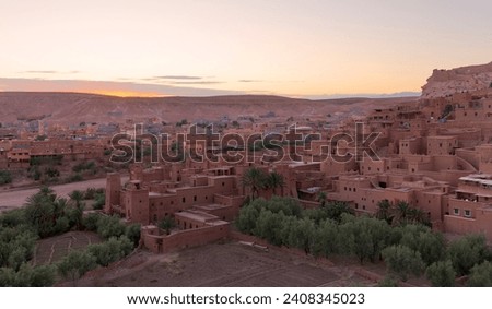 Amazing view of Kasbah Ait Ben Haddou near Ouarzazate in the Atlas Mountains of Morocco. UNESCO World Heritage Site since 1987. Artistic picture. Beauty world. Royalty-Free Stock Photo #2408345023