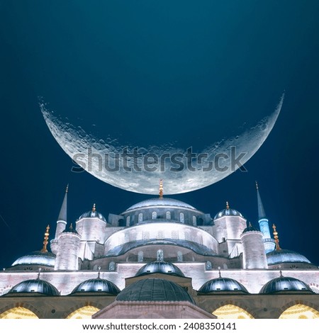 Sultanahmet or Blue Mosque with crescent moon. Ramadan concept image. Ramadan kareem or eid mubarak or kadir gecesi or laylat al-qadr background. Royalty-Free Stock Photo #2408350141
