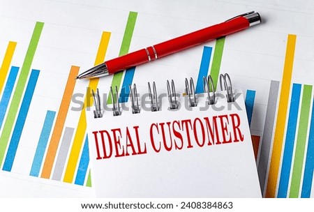 IDEAL CUSTOMER text on notebook with chart and pen business concept