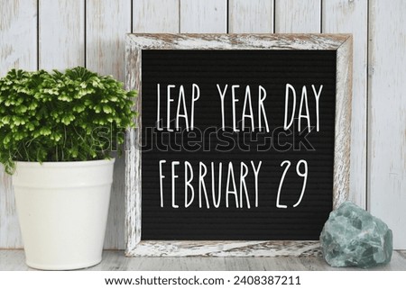 Leap Year Day, February 29, message board sign on desk - concept for event that happens every four years.