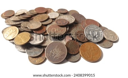 Various kinds of currency coins from various countries that are no longer used isolated on a white background. concept of collecting old money or metal coins