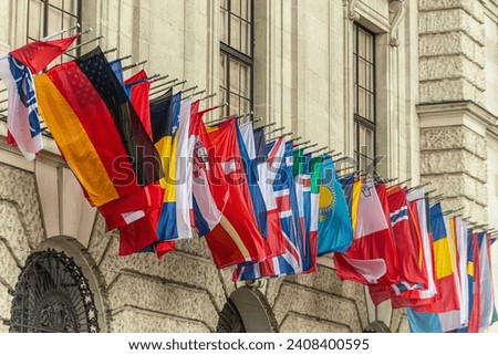 osce flags many national flags of different states hang on historical building in Hofburg, Wien. Worldwide, internationa Flags at the HQ of OSCE in Vienna, Austria