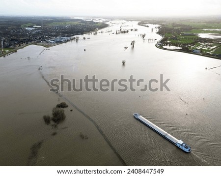 A high water level in the Ijssel river near Den Nulde, Holland